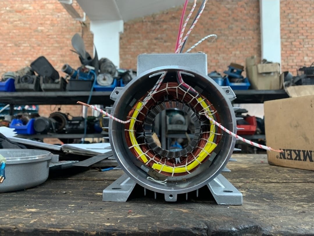Electric motor stator with copper windings during rewinding, Randburg workshop