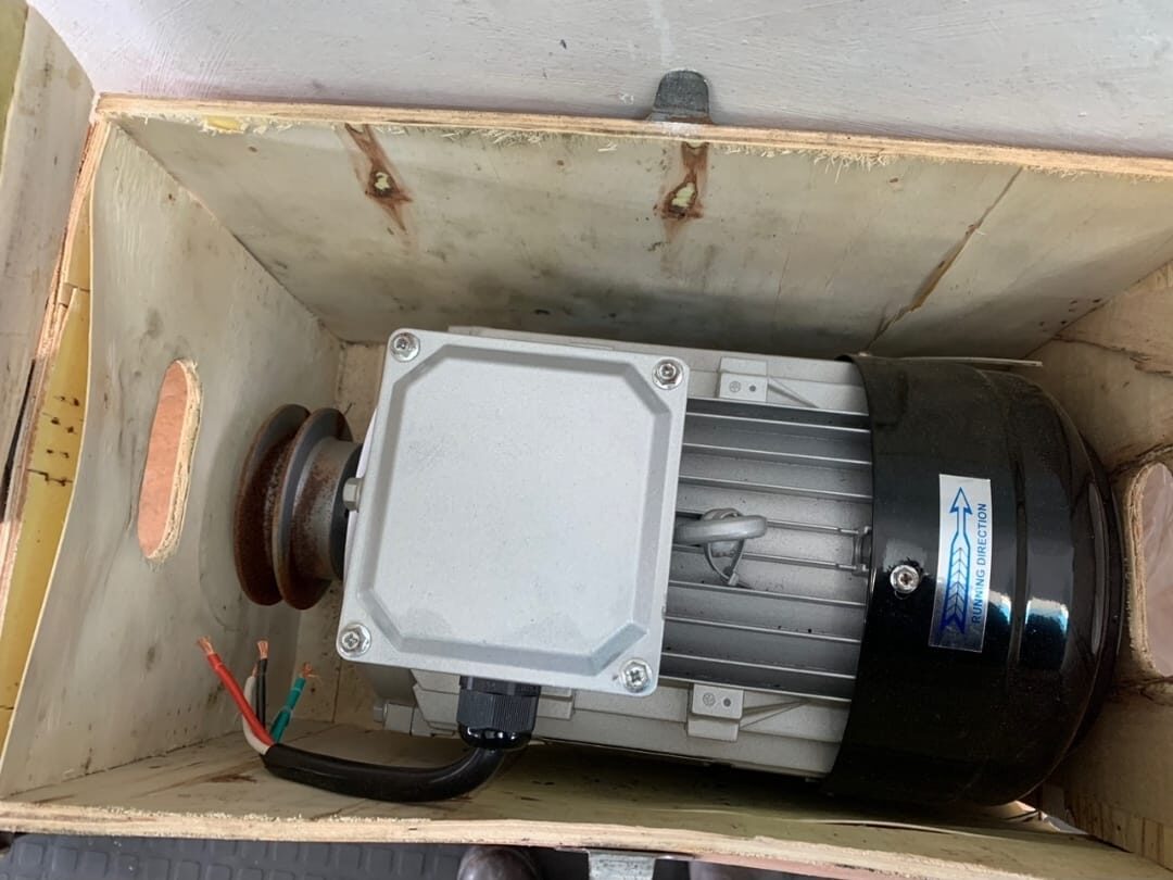 New electric motor crated and ready for installation